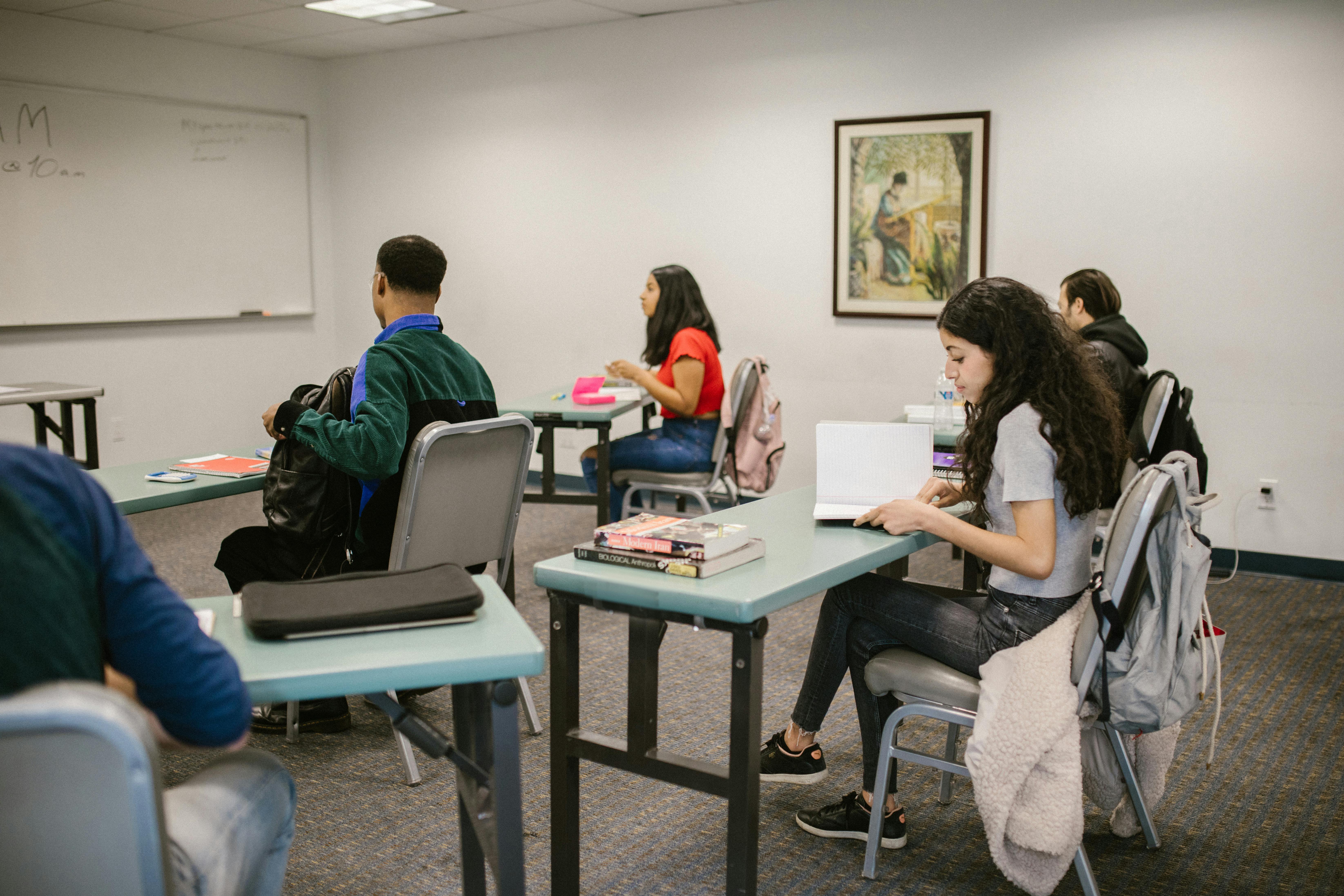 Students seated in a classroom environment, working through a lesson together.